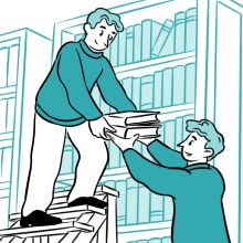 One man handling books to another