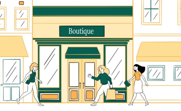 Three ladies walking near a boutique