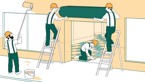A group of workers renovating a store