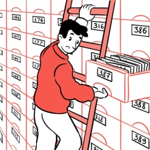Man on a ladder opening a drawer of a database