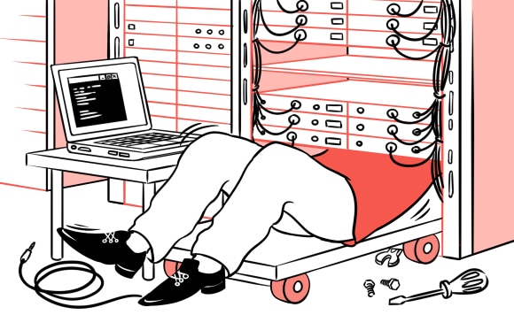 A man repairing a server