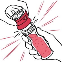 A grinding mechanism being added to a jar of spices