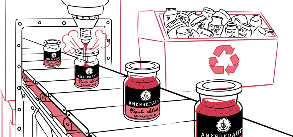 Spices being poured into jars