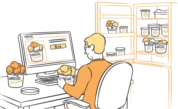 A man working on a laptop with ice cream all over his apartment