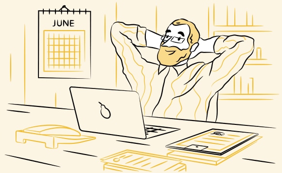 Relaxed man in front of his laptop