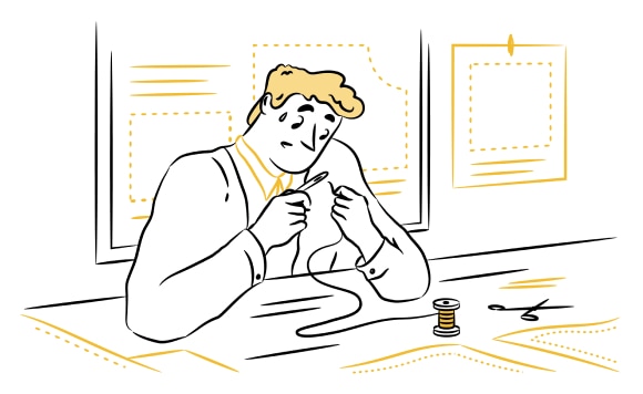 Man trying to put a thread through a needle