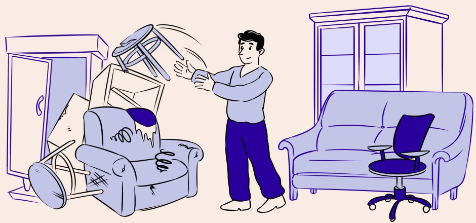 A man throwing away old furniture